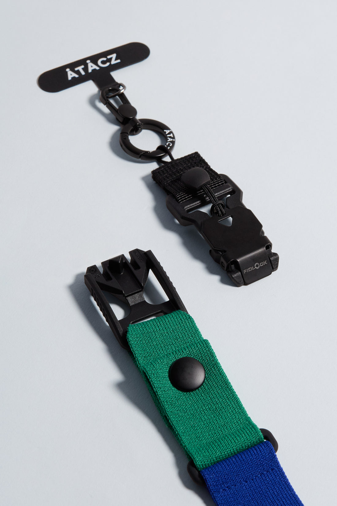 The CONNECT 2-in-1 sling-to-handle length, crafted from 100% recycled Repreve Nylon, combines premium materials with durable knitting technology. The FIDLOCK Buckle handles high tensile forces, and the quick-release feature ensures convenience. Plus, the universal Strap Card makes it compatible with all iPhone and Android cases.