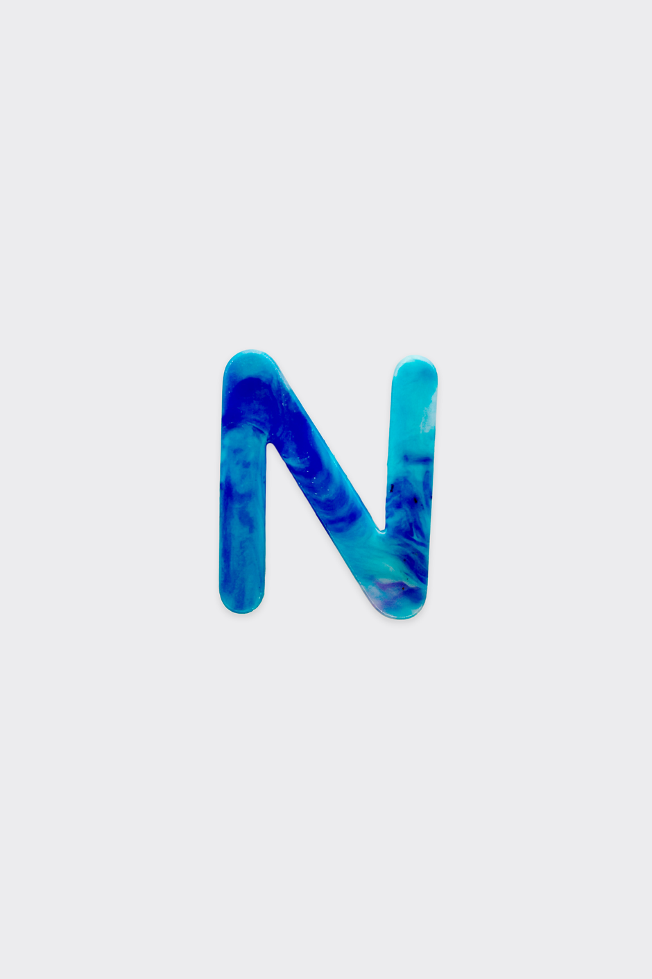Blue Plastic Letters — N